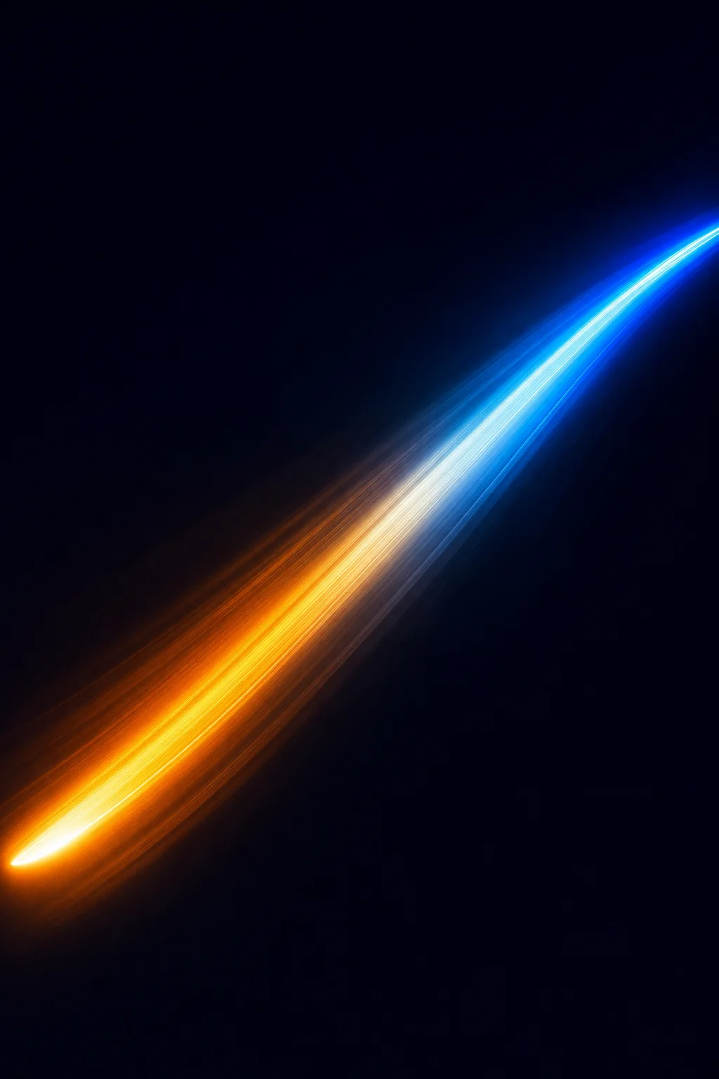 A long-exposure light streak sweeping from amber to cobalt across darkness